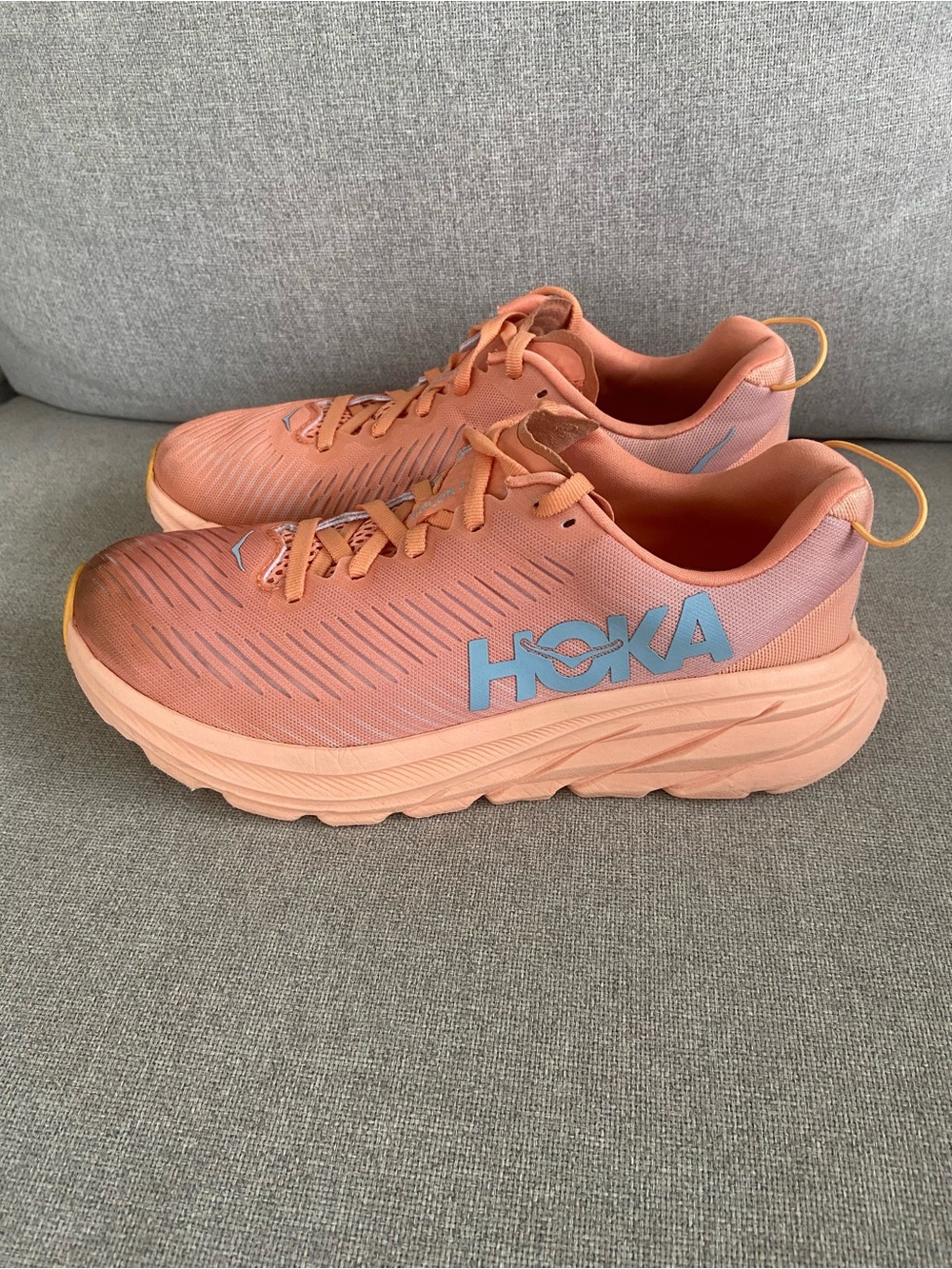 Hoka One One Peach Running Shoes with Blue Logo Accent
